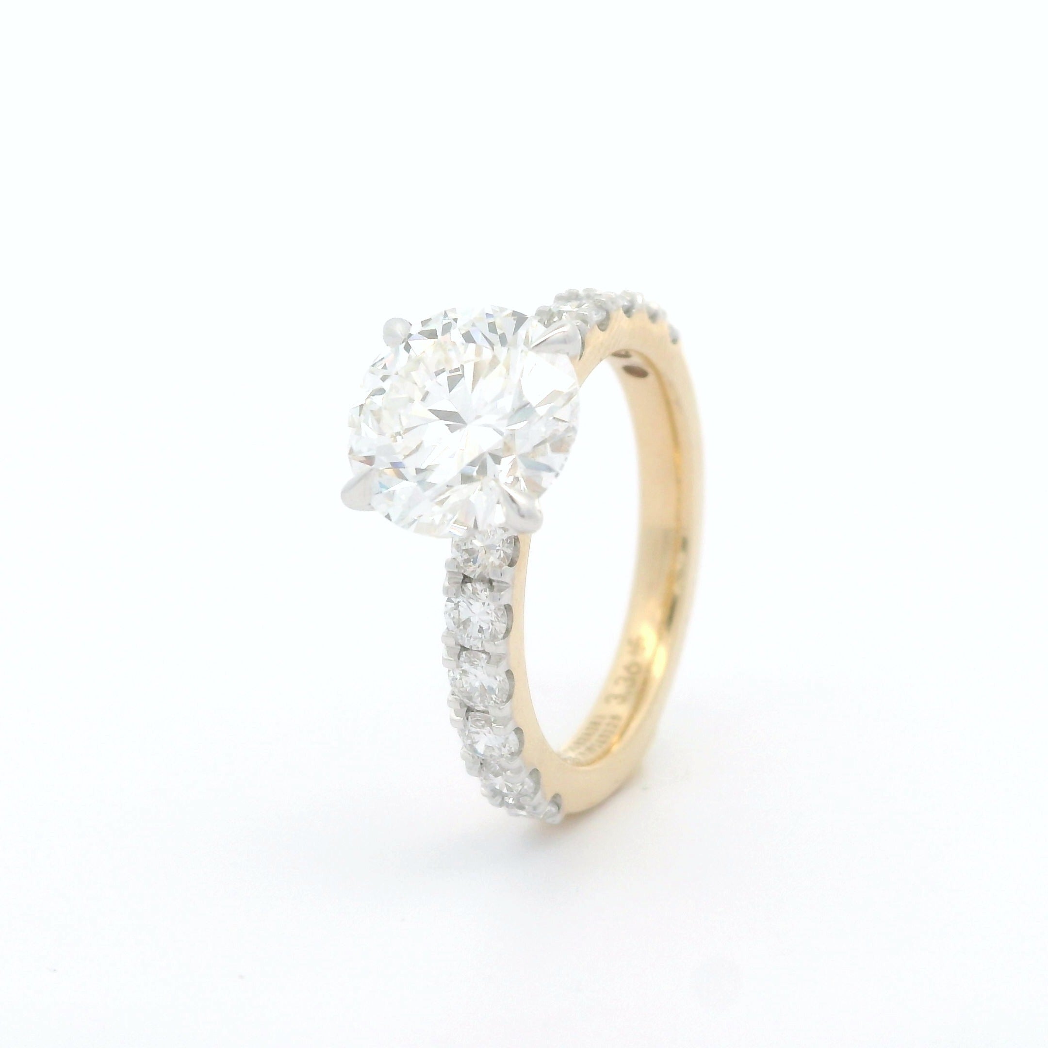 Solitaire Ring with 2.58 CT round lab grown diamond on 18k Yellow Gold