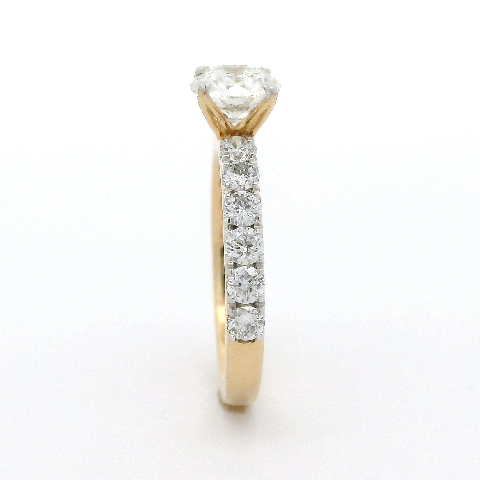 Solitaire Ring with 1.08 CT round lab grown diamond on 18k Yellow Gold